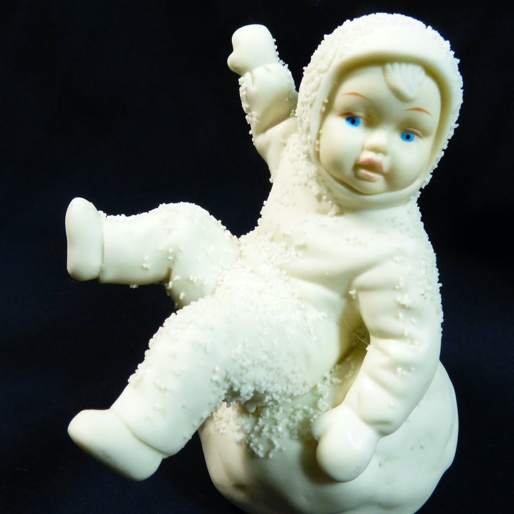 Snow Baby on Snow Ball Dept. 56 collectible figurine